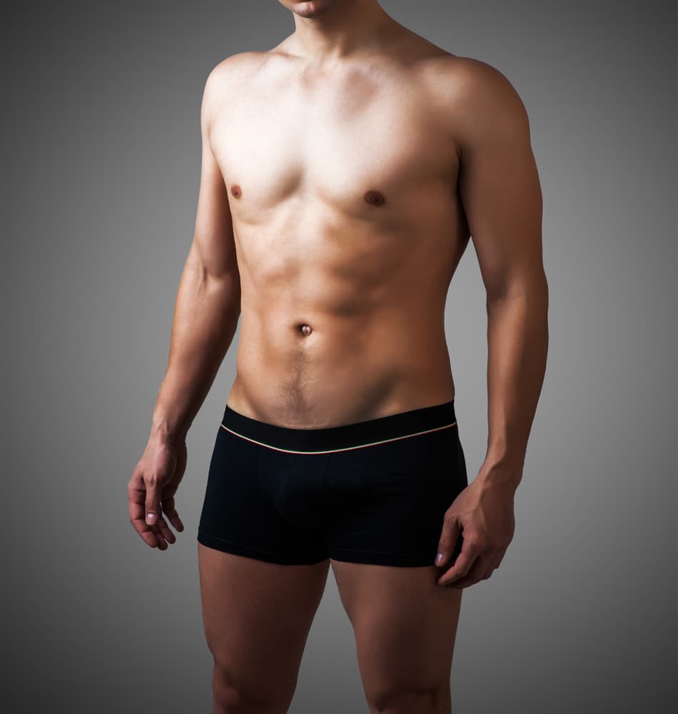 Athletic man with an even, bronzed tan from Sienna high-intensity tanning treatment in Weston-super-Mare