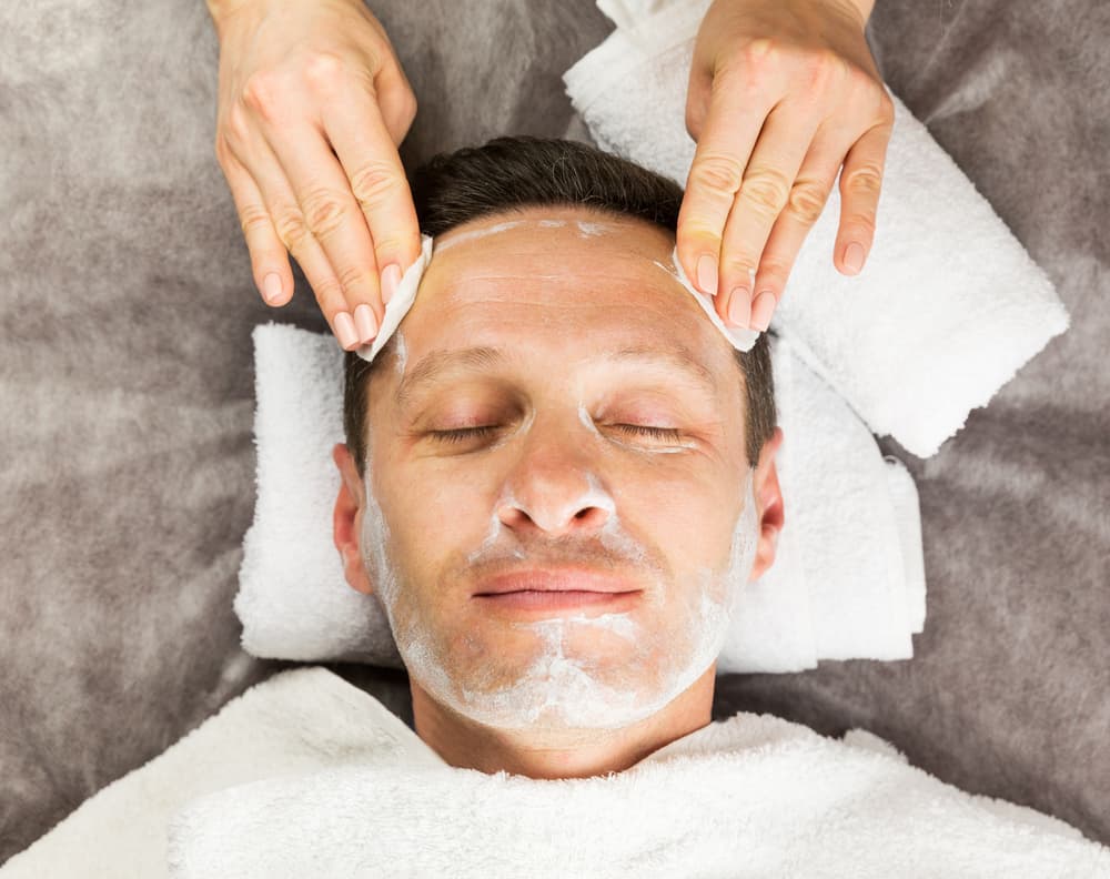 Middle-aged man enjoying a nourishing Tropic facial with cleansing treatment in a calm and private setting in Weston-super-Mare